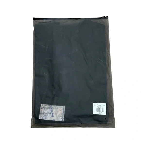 Fear of God Essentials Black Oversize Rubber Logo Patch Short Sleeve T-Shirt - Picture 12 of 13